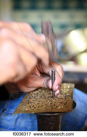 Morocco, Marrakech, souk, working metal View Large Photo Image Stock Photo - Morocco, Marrakech, souk, working metal. Fotosearch