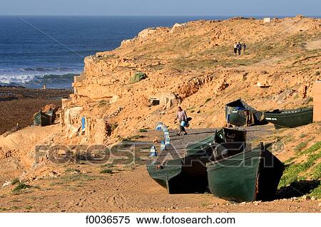Morocco, Tiznit, Aglou beach, boats View Large Photo Image Stock Photography - Morocco, Tiznit, Aglou beach, boats. Fotosearch
