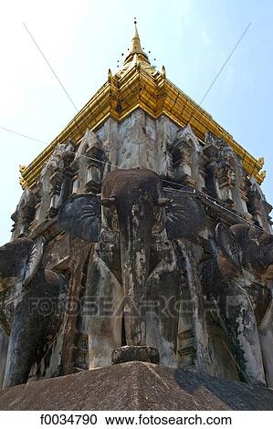 Stock Image - Thailand, Chiang Mai, Wat Chiang Man temple. Fotosearch