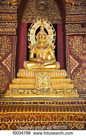 Thailand, Chiang Mai, Wat Phra Singh temple, golden Buddha View Large Photo Image Stock Photo - Thailand, Chiang Mai, Wat Phra Singh temple, golden Buddha. Fotosearch