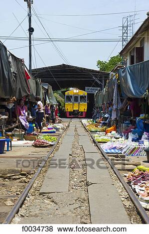 Stock Photo - Thailand, in the direction of Bangkok, Maeklong station, in the market. Fotosearch