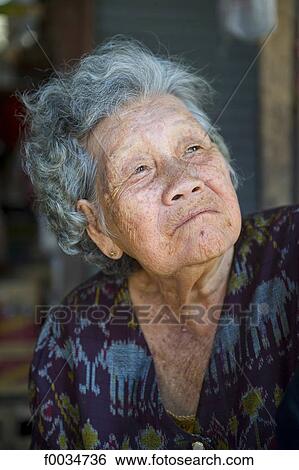 Thailand, in the direction of Bangkok, Maeklong station, in the market, old woman View Large Photo Image Stock Photograph - Thailand, in the direction of Bangkok, Maeklong station, in the market, old woman. Fotosearch