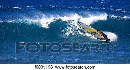 Stock Photo - United States, Hawaii, island of Maui, beach of Hoopika, surfer. Fotosearch