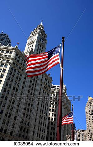 United States, Illinois, Chicago, Wrigley building and the american flag View Large Photo Image Picture - United States, Illinois, Chicago, Wrigley building and the american flag. Fotosearch