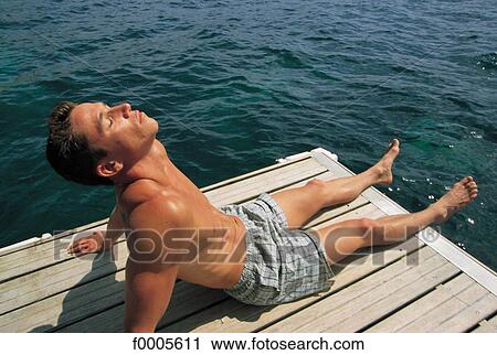 Stock Image - Relaxation and well being, lifestyle, people, adults. Fotosearch