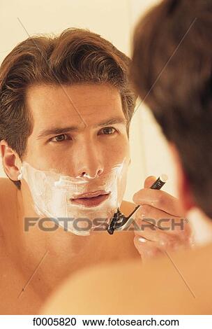 Stock Image - In the Bathroom, lifestyle, inside, indoor, indoor shots. Fotosearch