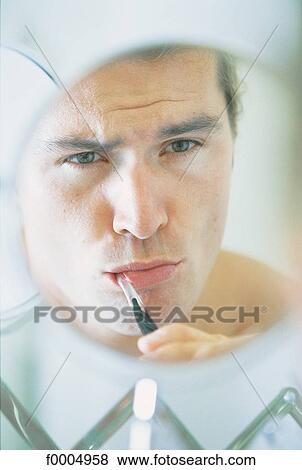Stock Photo - In the Bathroom, lifestyle, people, adults. Fotosearch