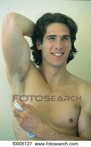Stock Photo - In the Bathroom, lifestyle, people, adults. Fotosearch