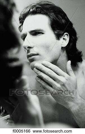 Stock Photograph - In the Bathroom, lifestyle, people, adults. Fotosearch