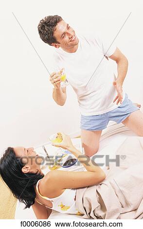 Stock Photograph - Love Nest, lifestyle, couple, couples, married. Fotosearch