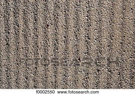 Stock Image - Elements and Nature, sand, footprint, horizontal format. Fotosearch