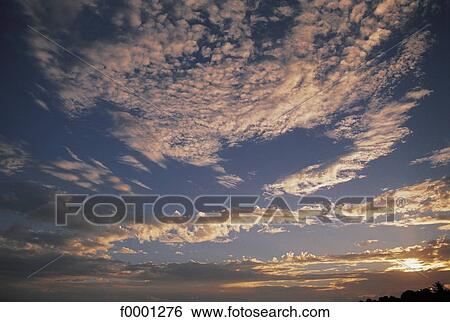 Stock Photograph - Elements and Nature, sunset, cloud, clouds, cloudy, sky. Fotosearch