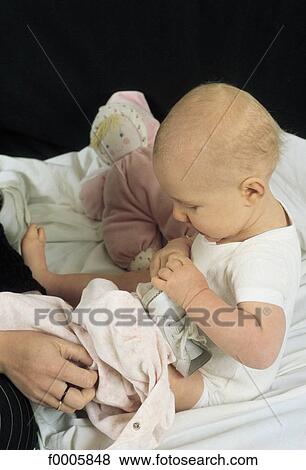 Babies, lifestyle, baby, clothes, shoe View Large Photo Image Stock Photo - Babies, lifestyle, baby, clothes, shoe. Fotosearch