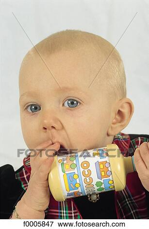 Stock Photo - Babies, lifestyle, inside, indoor, indoor shots. Fotosearch
