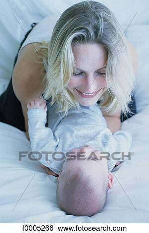 Babies, lifestyle, woman, girl, women View Large Photo Image Stock Photograph - Babies, lifestyle, woman, girl, women. Fotosearch