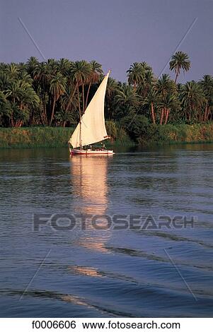 Stock Photograph - Egyp, Egypt, felucca on the Nile River between Aswan and Luxor. Fotosearch