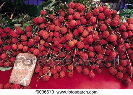Stock Image - Reunion, Lychee stall at the Saint-Denis market. Fotosearch