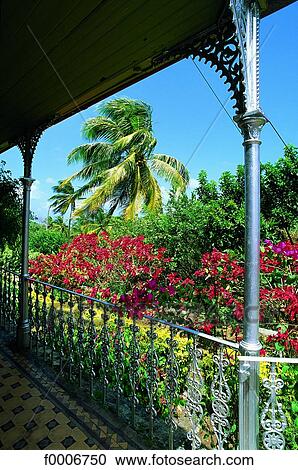 Stock Image - French West Indies, Guadeloupe, balcony of colonial house. Fotosearch