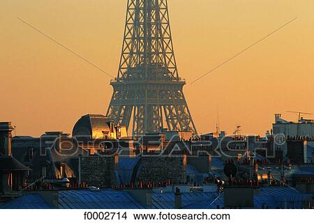 Picture - France, Paris, Eiffel Tower and Paris rooftops. Fotosearch