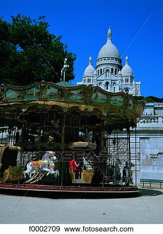 France, Paris, Merry-go-round in front of the Sacre Coeur View Large Photo Image Stock Photo - France, Paris, Merry-go-round in front of the Sacre Coeur. Fotosearch