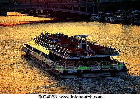 Stock Image - France, Paris, Riverbus on the Seine River. Fotosearch