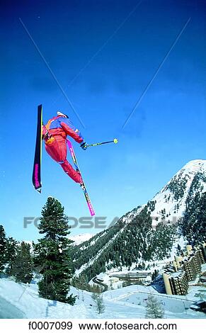France, Alps, La Plagne, jumping skier View Large Photo Image Stock Photo - France, Alps, La Plagne, jumping skier. Fotosearch