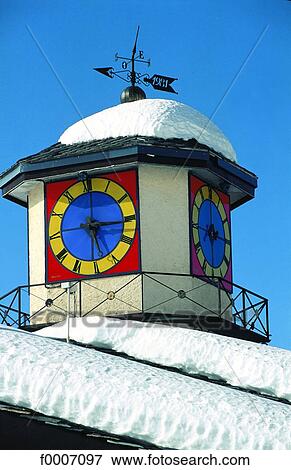 France, Alps, La Plagne, weather vane and clock View Large Photo Image Stock Photo - France, Alps, La Plagne, weather vane and clock. Fotosearch