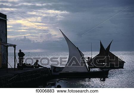 Mauritius Island, fishermen at dusk View Large Photo Image Stock Image - Mauritius Island, fishermen at dusk. Fotosearch