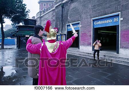 Stock Photograph - Italy, Rome, Comedians in front of subway. Fotosearch