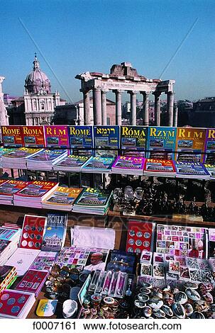Stock Image - Italy, Rome, Forum souvenirs and guides stall. Fotosearch