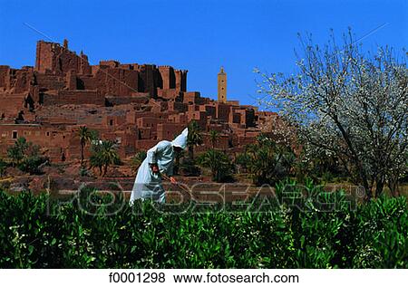 Morocco, Kasbah of Tifoultout, Fellah in foreground View Large Photo Image Stock Photo - Morocco, Kasbah of Tifoultout, Fellah in foreground. Fotosearch