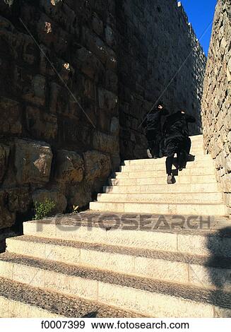 Jerusalem, Jews going up the stairs View Large Photo Image Stock Photo - Jerusalem, Jews going up the stairs. Fotosearch