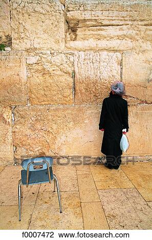 Jerusalem, Man in front of the Wailing Wall View Large Photo Image Stock Image - Jerusalem, Man in front of the Wailing Wall. Fotosearch