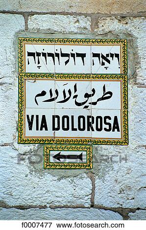 Stock Photo - Jerusalem, Road sign on the Golgotha. Fotosearch