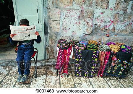 Stock Photo - Jerusalem, Young hat vendor. Fotosearch