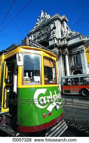 Stock Photo - Portugal, Lisbon, Commerce square, tramway and Arco da Victoria. Fotosearch