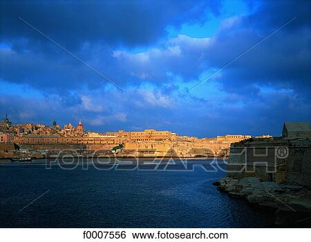 Stock Photograph - Malta, La Valette, view on the ramparts from Fort Ricasoli. Fotosearch
