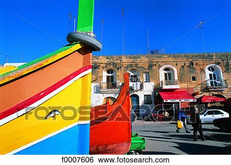 Malta, Luzzus in Marsaxlokk harbour View Large Photo Image Stock Photograph - Malta, Luzzus in Marsaxlokk harbour. Fotosearch
