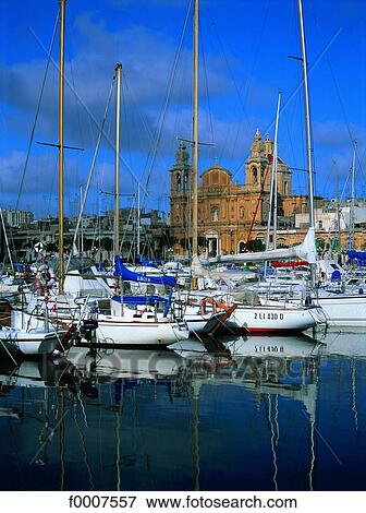 Stock Photo - Malta, Msida harbour and St Joseph church. Fotosearch