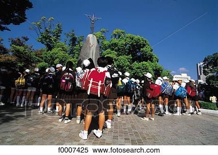 Japan, Hiroshima, school children visiting memorial View Large Photo Image Stock Photography - Japan, Hiroshima, school children visiting memorial. Fotosearch