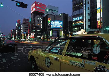 Stock Photo - Japan, Tokyo, taxi in Ginza by night. Fotosearch