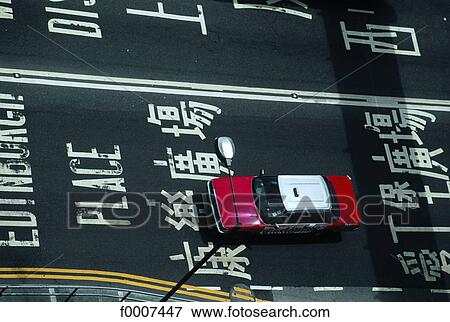 Stock Photo - China, Hong Kong, red cab, high angle view. Fotosearch