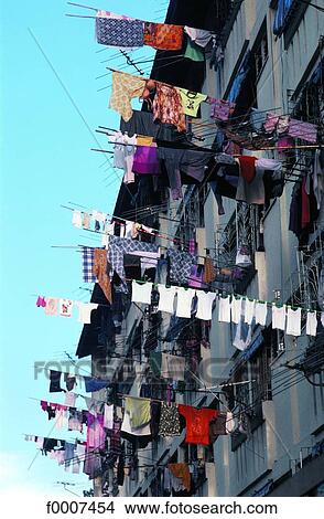 Indonesia, Singapour, clothes drying at windows View Large Photo Image Picture - Indonesia, Singapour, clothes drying at windows. Fotosearch