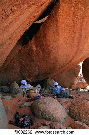 Algeria, Sahara, Hoggar massif, two Tuaregs resting View Large Photo Image Stock Image - Algeria, Sahara, Hoggar massif, two Tuaregs resting. Fotosearch