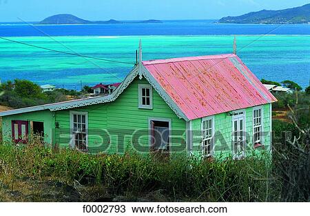 Stock Image - Grenade, colonial wood cabin . Fotosearch