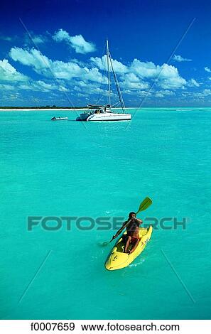 Virgin Islands, kayak and catamaran in the distance View Large Photo Image Stock Photo - Virgin Islands, kayak and catamaran in the distance. Fotosearch