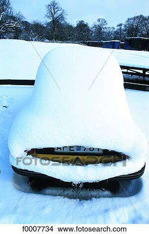 Sweden, Stockholm, Car under the snow View Large Photo Image Picture - Sweden, Stockholm, Car under the snow. Fotosearch