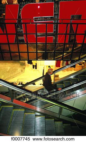 Stock Photography - Sweden, Stockholm, Escalators in department store. Fotosearch