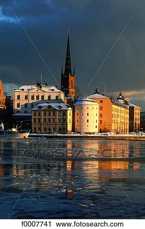 Sweden, Stockholm, Sunsetting on Gamla Stan and Riddar Holmen View Large Photo Image Stock Image - Sweden, Stockholm, Sunsetting on Gamla Stan and Riddar Holmen. Fotosearch