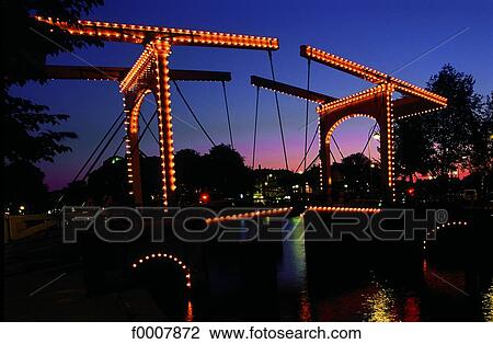 The Netherlands, Amsterdam, bridge and canal by night View Large Photo Image Stock Image - The Netherlands, Amsterdam, bridge and canal by night. Fotosearch